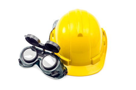 Yellow construction helmet and Protective Eyewear isolated on white Clipping pathの写真素材