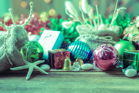 Christmas and New Year garland on rustic wood with copy space retro style toned pictureの写真素材