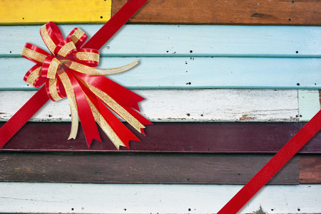 A multicolored wooden wall as a backgroundの写真素材