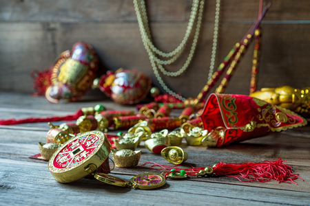 Chinese new year festival decorations on wooden tableの写真素材