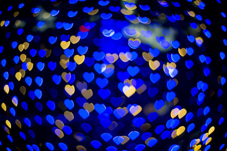 Multicolour bokeh Heart shape ,defocused bokeh lights as backgroundの写真素材