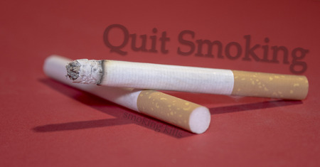2 1 cigarettes glowing with Textの写真素材