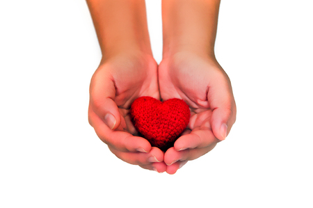 hands giving red heart, isolate on white background, valentine festival conceptの写真素材