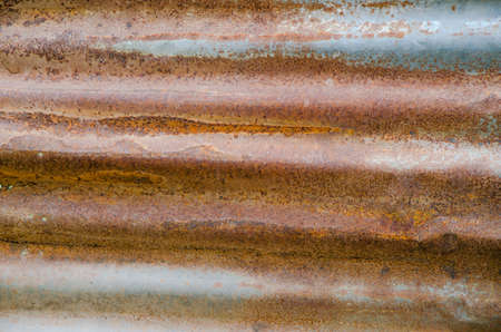 Corrugated roofing sheet is rusty brown.の写真素材