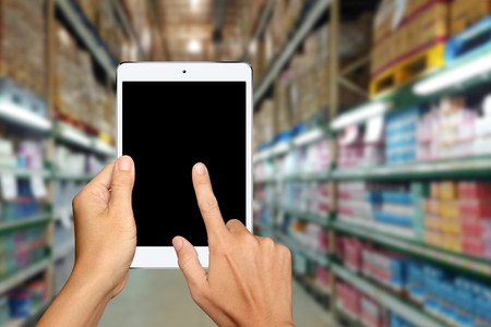 Hand holding and Touch on White Tablet PC,online shopping conceptの写真素材