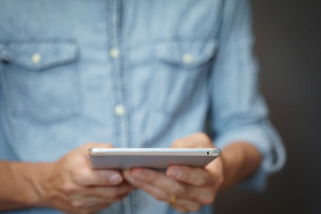 Social media a man using a tablet pc