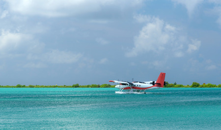 Colorful aerial photo of Maldives atolls and deep blue sea