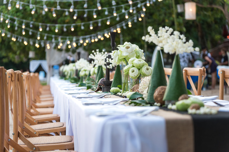 Beautiful table set up by the beachの写真素材