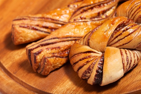 Chocolate bread selection on wood boardの写真素材