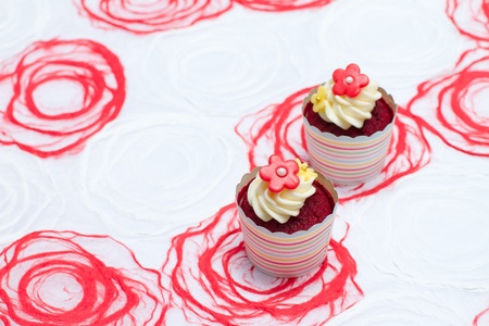 cupcake red velvet with cream cheese icing and cute decoration, close up shotの写真素材