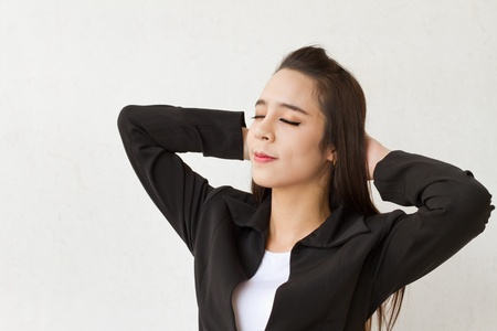 postitive, relaxing, smiling female business executiveの写真素材