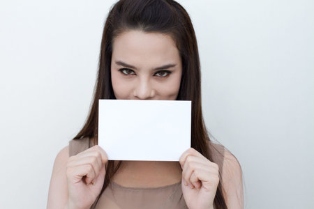 woman hand holding blank card envelope size for text spaceの写真素材