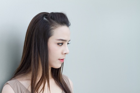 female looking at blank space, tiring moodの写真素材