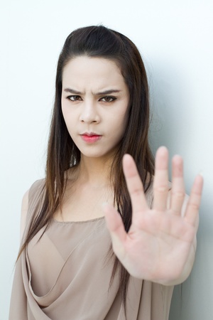 stop hand sign from beautiful womanの写真素材