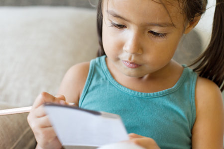 girl writing, drawing with pencilの写真素材