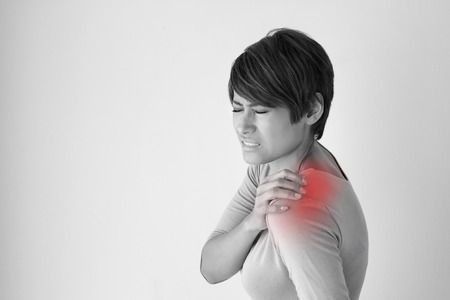 woman with shoulder pain or stiffness woman with shoulder pain or stiffness