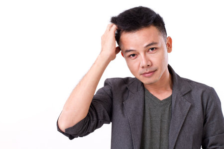 hesitate, doubtful man, white isolated backgroundの写真素材