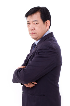senior business executive crossing armsの写真素材