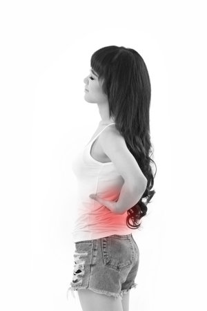 woman suffering from back pain or injury