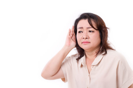 middle aged woman listening to bad news