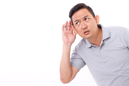 curious man listeningの写真素材