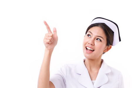 nurse pointing up, raising one fingerの写真素材