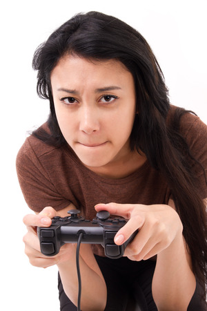 stressed, exited female gamer isolatedの写真素材