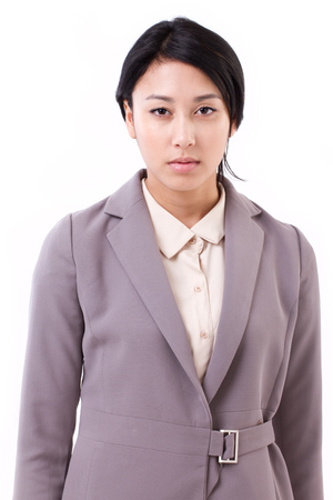 portrait of confident, serious asian caucasian business womanの写真素材