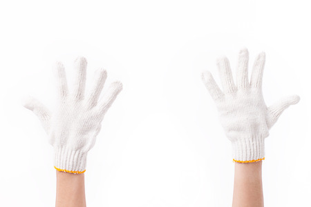 worker double back hands pointing up with industrial or agricultural cotton gloveの写真素材