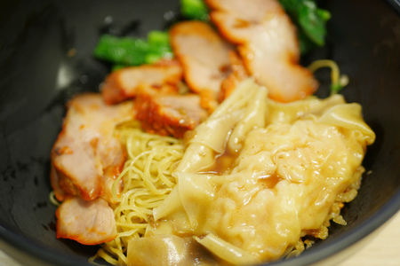 Cantonese Hongkong noodle with shrimp dumpling and roasted porkの写真素材