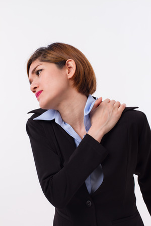 business woman suffering from shoutder pain, overwork, office syndromeの写真素材