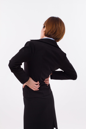 woman suffering from back pain, injury, office syndromeの写真素材