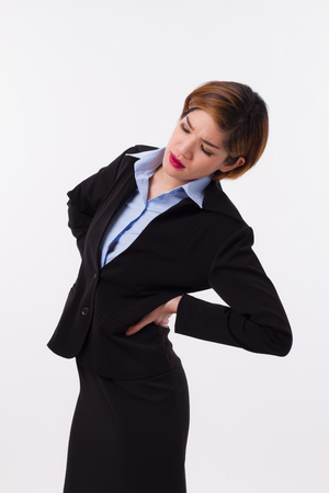 woman suffering from back pain, injury, office syndromeの写真素材