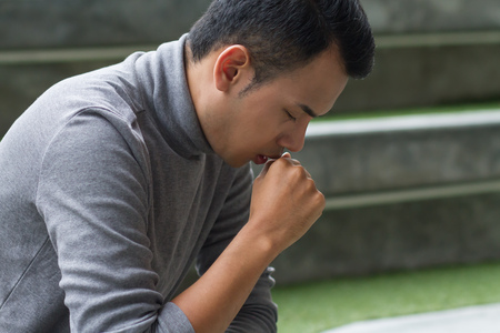 allergic sick asian man coughingの写真素材