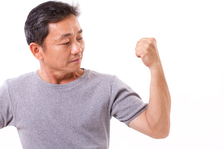 strong old or middle aged man white isolatedの写真素材