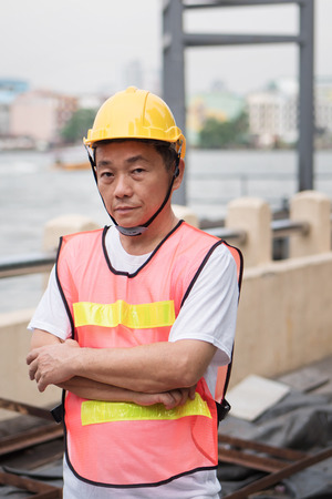 port labor, industrial logistics working staff standing at working siteの写真素材