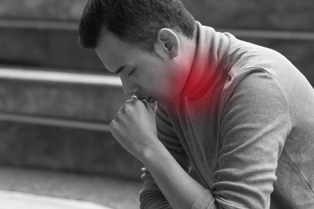 allergic sick asian man coughingの写真素材