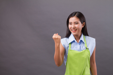 strong successful shop keeper looking sidewayの写真素材
