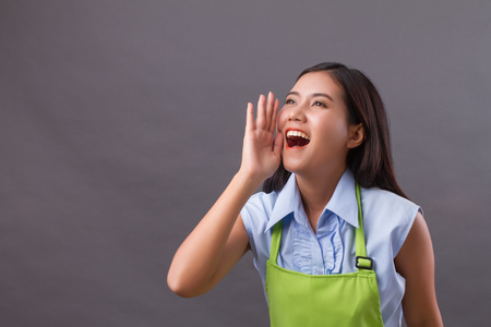 woman worker shouting, speaking, communicating, announcingの写真素材