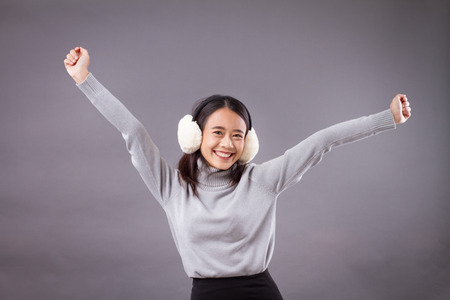 happy exited successful asian womanの写真素材