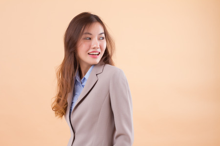 happy business woman looking awayの写真素材