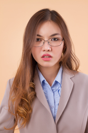 unhappy upset business woman with glassesの写真素材