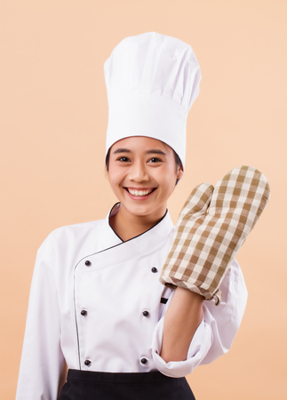 happy smiling woman baker portraitの写真素材