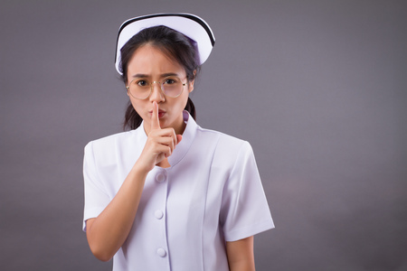 angry nurse asking for silenceの写真素材