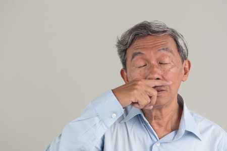 sick old senior man, flu, cold, runny noseの写真素材