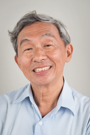 happy smiling positive old senior retired man portraitの写真素材
