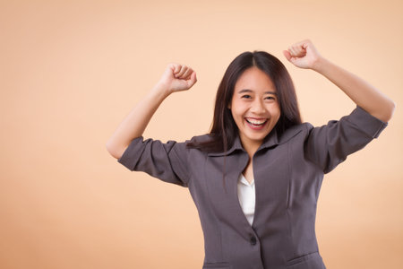 portrait of excited happy smiling asian business womanの写真素材
