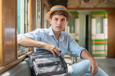 portrait of man backpack traveler with hat; concept of traveling, tourism, vacation trip, backpack...