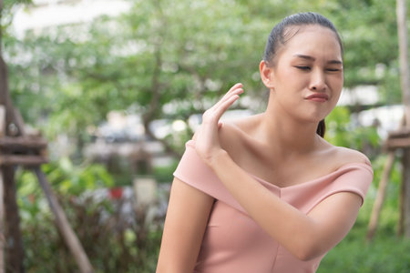 rejecting woman saying stop, no, halt with hand gesture