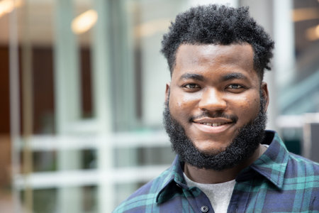 Happy African black man thinking, planning, finding good idea